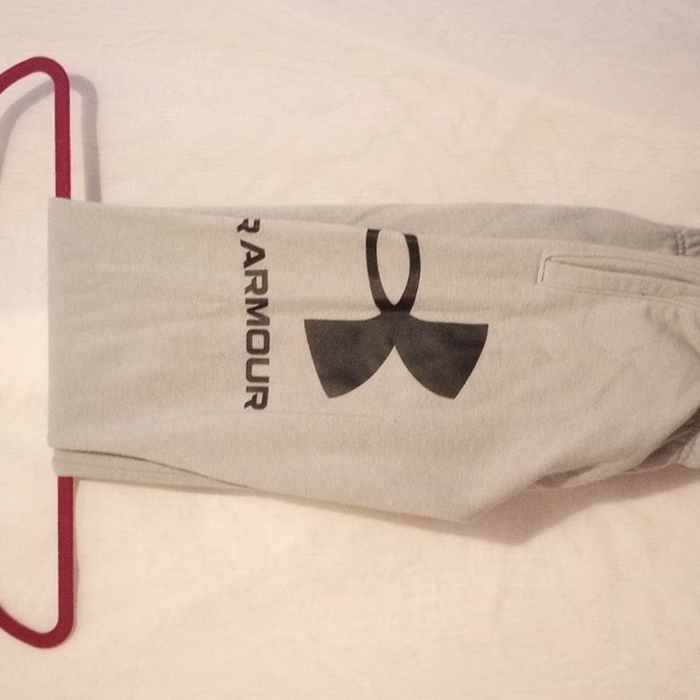 4 pair of Under Armour youth sweat pants.